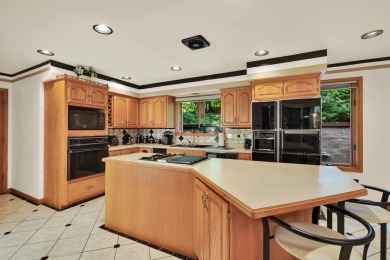 Stunning Contemporary Brookfield Estate.Your updates throughout on Brookfield Hills Golf Course in Wisconsin - for sale on GolfHomes.com, golf home, golf lot