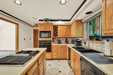 Stunning Contemporary Brookfield Estate.Your updates throughout on Brookfield Hills Golf Course in Wisconsin - for sale on GolfHomes.com, golf home, golf lot