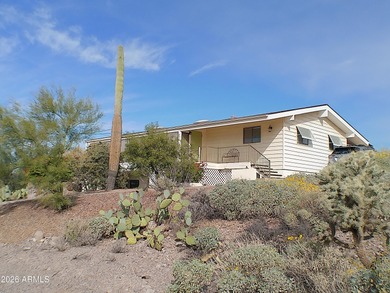 Looking for a home offering dark skies, quiet evenings, and on Queen Valley Golf Course in Arizona - for sale on GolfHomes.com, golf home, golf lot