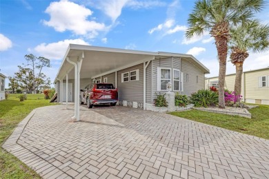 FANTASTIC PRICE REDUCTION for golf course views overlooking the on Maple Leaf Golf and Country Club in Florida - for sale on GolfHomes.com, golf home, golf lot