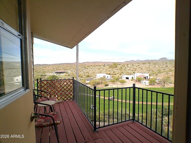 Looking for a home offering dark skies, quiet evenings, and on Queen Valley Golf Course in Arizona - for sale on GolfHomes.com, golf home, golf lot