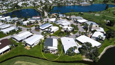 FANTASTIC PRICE REDUCTION for golf course views overlooking the on Maple Leaf Golf and Country Club in Florida - for sale on GolfHomes.com, golf home, golf lot