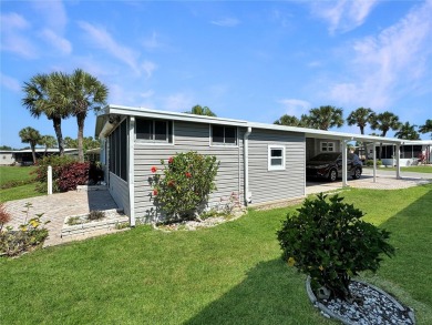 FANTASTIC PRICE REDUCTION for golf course views overlooking the on Maple Leaf Golf and Country Club in Florida - for sale on GolfHomes.com, golf home, golf lot