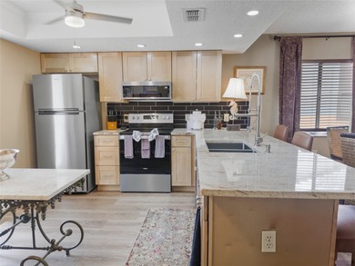 Newly listed and fully upgraded, this end-unit condo in the on Beacon Woods Golf Club in Florida - for sale on GolfHomes.com, golf home, golf lot