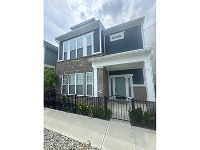 Discover the perfect blend of timeless charm and modern comfort on The Fort Golf Course in Indiana - for sale on GolfHomes.com, golf home, golf lot