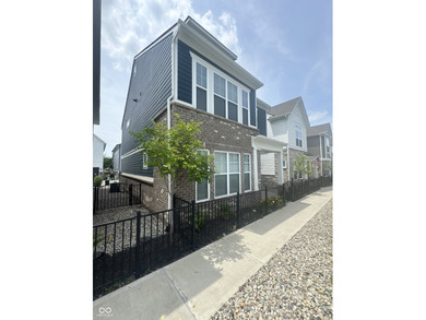 Discover the perfect blend of timeless charm and modern comfort on The Fort Golf Course in Indiana - for sale on GolfHomes.com, golf home, golf lot