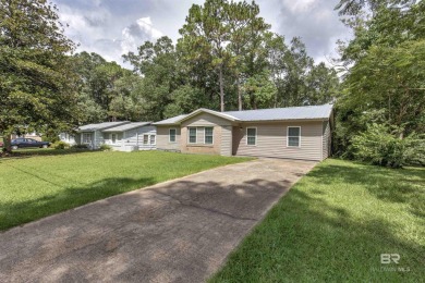 This updated 4-bedroom, 2-bath home is an excellent opportunity on Azalea City Golf Course in Alabama - for sale on GolfHomes.com, golf home, golf lot