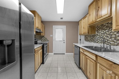 This updated 4-bedroom, 2-bath home is an excellent opportunity on Azalea City Golf Course in Alabama - for sale on GolfHomes.com, golf home, golf lot