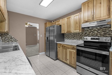 This updated 4-bedroom, 2-bath home is an excellent opportunity on Azalea City Golf Course in Alabama - for sale on GolfHomes.com, golf home, golf lot