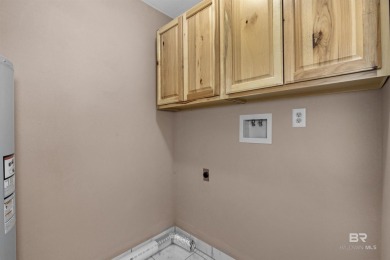 This updated 4-bedroom, 2-bath home is an excellent opportunity on Azalea City Golf Course in Alabama - for sale on GolfHomes.com, golf home, golf lot