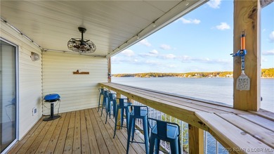 Discover the perfect blend of lakefront luxury and location at on Sycamore Creek Golf Club in Missouri - for sale on GolfHomes.com, golf home, golf lot