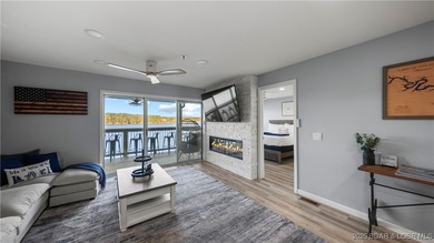 Discover the perfect blend of lakefront luxury and location at on Sycamore Creek Golf Club in Missouri - for sale on GolfHomes.com, golf home, golf lot