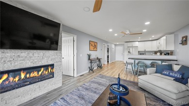 Discover the perfect blend of lakefront luxury and location at on Sycamore Creek Golf Club in Missouri - for sale on GolfHomes.com, golf home, golf lot