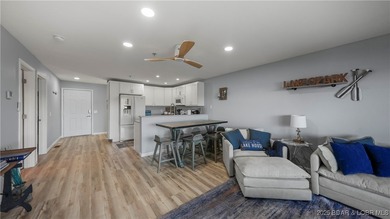 Discover the perfect blend of lakefront luxury and location at on Sycamore Creek Golf Club in Missouri - for sale on GolfHomes.com, golf home, golf lot