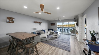 Discover the perfect blend of lakefront luxury and location at on Sycamore Creek Golf Club in Missouri - for sale on GolfHomes.com, golf home, golf lot