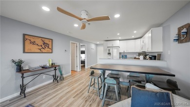 Discover the perfect blend of lakefront luxury and location at on Sycamore Creek Golf Club in Missouri - for sale on GolfHomes.com, golf home, golf lot