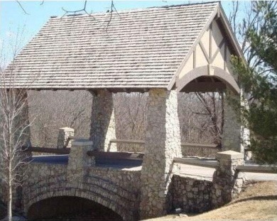 High cliff valley-views overlook the magnificent 18-hole on Ledgestone Country Club and Golf Course in Missouri - for sale on GolfHomes.com, golf home, golf lot