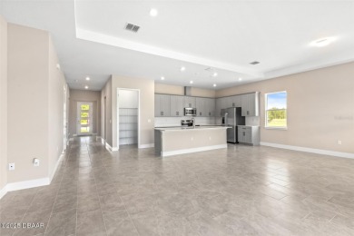 Welcome to 'The Lydia', a luxurious 2-story home in the on LPGA International Golf Course in Florida - for sale on GolfHomes.com, golf home, golf lot