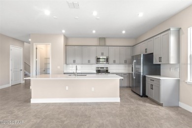 Welcome to 'The Lydia', a luxurious 2-story home in the on LPGA International Golf Course in Florida - for sale on GolfHomes.com, golf home, golf lot