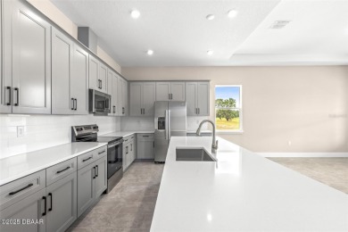 Welcome to 'The Lydia', a luxurious 2-story home in the on LPGA International Golf Course in Florida - for sale on GolfHomes.com, golf home, golf lot