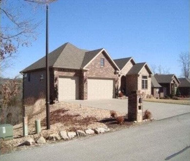 High cliff valley-views overlook the magnificent 18-hole on Ledgestone Country Club and Golf Course in Missouri - for sale on GolfHomes.com, golf home, golf lot