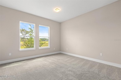 Welcome to 'The Lydia', a luxurious 2-story home in the on LPGA International Golf Course in Florida - for sale on GolfHomes.com, golf home, golf lot