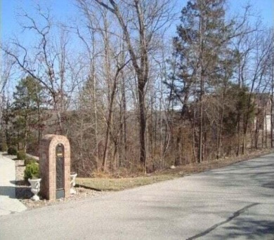 High cliff valley-views overlook the magnificent 18-hole on Ledgestone Country Club and Golf Course in Missouri - for sale on GolfHomes.com, golf home, golf lot