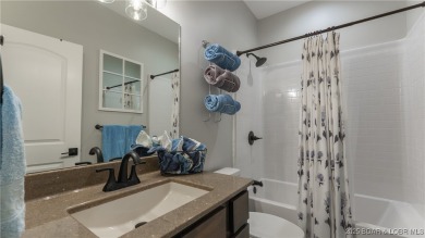 NEW CONSTRUCTION 2023 IN OAKWOOD HILLS ESTATES! One level home on Bayview Golf Course in Missouri - for sale on GolfHomes.com, golf home, golf lot