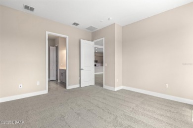 Welcome to 'The Lydia', a luxurious 2-story home in the on LPGA International Golf Course in Florida - for sale on GolfHomes.com, golf home, golf lot