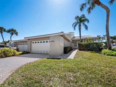 Positioned along the par-5 fairway with tranquil lake views on Longboat Key Golf Club Resort in Florida - for sale on GolfHomes.com, golf home, golf lot