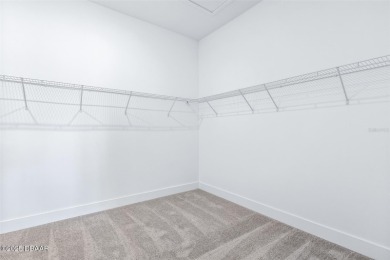 Welcome to 'The Lydia', a luxurious 2-story home in the on LPGA International Golf Course in Florida - for sale on GolfHomes.com, golf home, golf lot