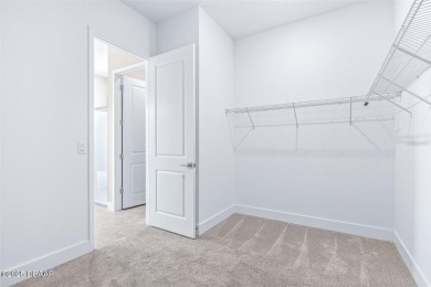 Welcome to 'The Lydia', a luxurious 2-story home in the on LPGA International Golf Course in Florida - for sale on GolfHomes.com, golf home, golf lot