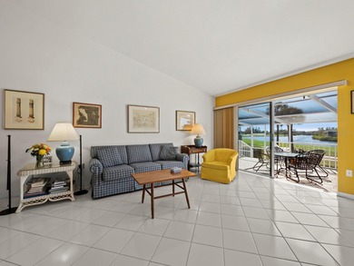 Positioned along the par-5 fairway with tranquil lake views on Longboat Key Golf Club Resort in Florida - for sale on GolfHomes.com, golf home, golf lot