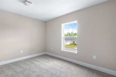 Welcome to 'The Lydia', a luxurious 2-story home in the on LPGA International Golf Course in Florida - for sale on GolfHomes.com, golf home, golf lot