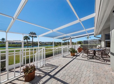 Positioned along the par-5 fairway with tranquil lake views on Longboat Key Golf Club Resort in Florida - for sale on GolfHomes.com, golf home, golf lot