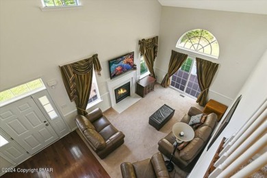 Experience Luxury & Maintenance Free Living in this END UNIT on Country Club of the Poconos Golf Course in Pennsylvania - for sale on GolfHomes.com, golf home, golf lot