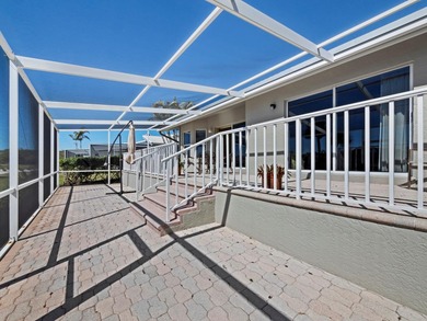 Positioned along the par-5 fairway with tranquil lake views on Longboat Key Golf Club Resort in Florida - for sale on GolfHomes.com, golf home, golf lot