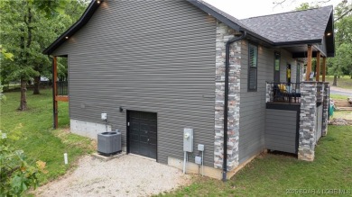 NEW CONSTRUCTION 2023 IN OAKWOOD HILLS ESTATES! One level home on Bayview Golf Course in Missouri - for sale on GolfHomes.com, golf home, golf lot