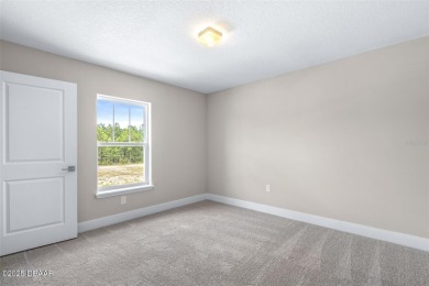 Welcome to 'The Lydia', a luxurious 2-story home in the on LPGA International Golf Course in Florida - for sale on GolfHomes.com, golf home, golf lot