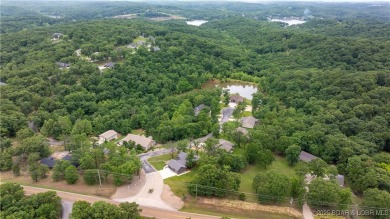 NEW CONSTRUCTION 2023 IN OAKWOOD HILLS ESTATES! One level home on Bayview Golf Course in Missouri - for sale on GolfHomes.com, golf home, golf lot
