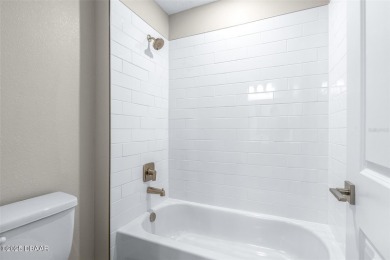 Welcome to 'The Lydia', a luxurious 2-story home in the on LPGA International Golf Course in Florida - for sale on GolfHomes.com, golf home, golf lot