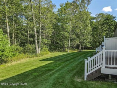 Experience Luxury & Maintenance Free Living in this END UNIT on Country Club of the Poconos Golf Course in Pennsylvania - for sale on GolfHomes.com, golf home, golf lot