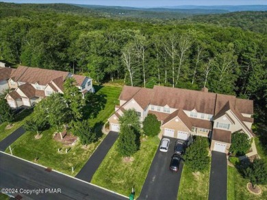 Experience Luxury & Maintenance Free Living in this END UNIT on Country Club of the Poconos Golf Course in Pennsylvania - for sale on GolfHomes.com, golf home, golf lot