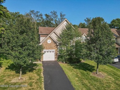 Experience Luxury & Maintenance Free Living in this END UNIT on Country Club of the Poconos Golf Course in Pennsylvania - for sale on GolfHomes.com, golf home, golf lot