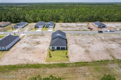 Welcome to 'The Lydia', a luxurious 2-story home in the on LPGA International Golf Course in Florida - for sale on GolfHomes.com, golf home, golf lot