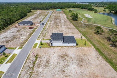 Welcome to 'The Lydia', a luxurious 2-story home in the on LPGA International Golf Course in Florida - for sale on GolfHomes.com, golf home, golf lot