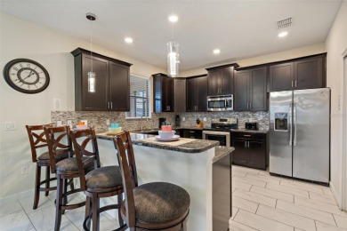Welcome to Your Home Away From Home. Get Ready, resort-style on The Oasis Club at Champions Gate in Florida - for sale on GolfHomes.com, golf home, golf lot