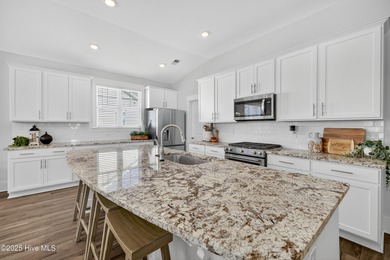 Welcome to 7952 Harrier Circle in the sought-after Heron Pointe on Cape Fear National At Brunswick Forest in North Carolina - for sale on GolfHomes.com, golf home, golf lot