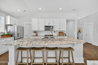 Welcome to 7952 Harrier Circle in the sought-after Heron Pointe on Cape Fear National At Brunswick Forest in North Carolina - for sale on GolfHomes.com, golf home, golf lot