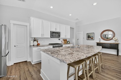 Welcome to 7952 Harrier Circle in the sought-after Heron Pointe on Cape Fear National At Brunswick Forest in North Carolina - for sale on GolfHomes.com, golf home, golf lot